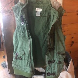 Maurice’s green vest faux fur hood